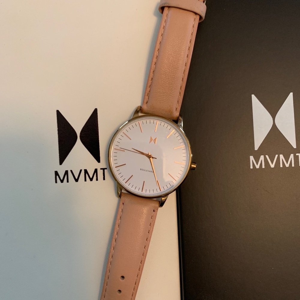 Tan leather women’s movement watch EUC
